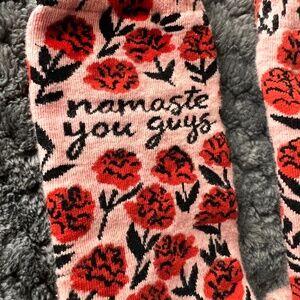 Set of 2 Ladies’ socks with sayings.  Yoga and work humor.